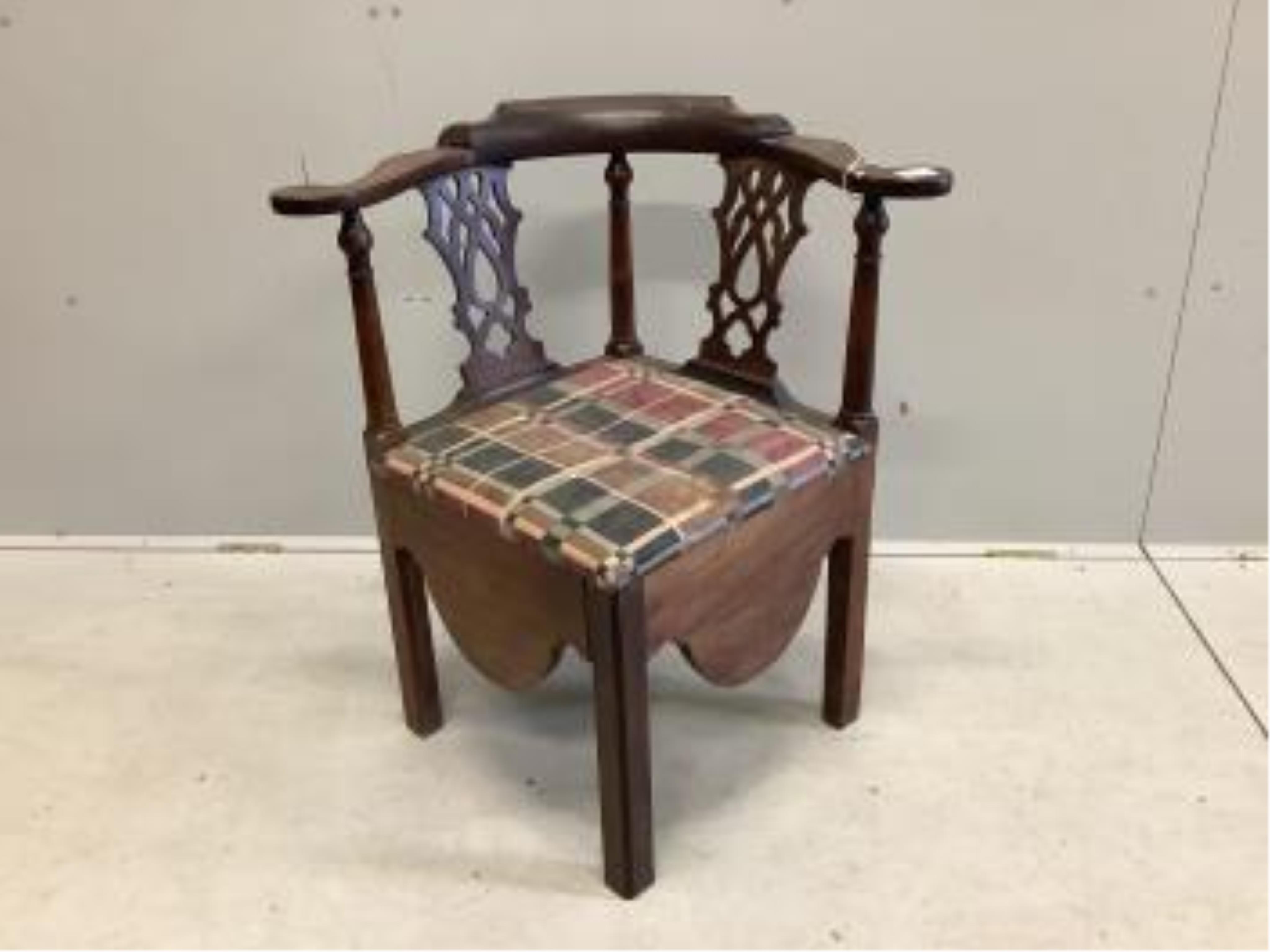 A George III mahogany corner commode chair, width 74cm, depth 64cm, height 80cm. Condition - fair, seat poor